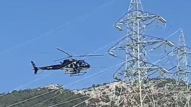 Bodrum'da yüksek gerilim hatları helikopterle temizlendi